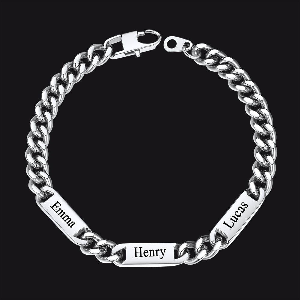 Silver chain bracelet with engraved names on a black background