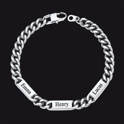 Silver chain bracelet with engraved names on a black background