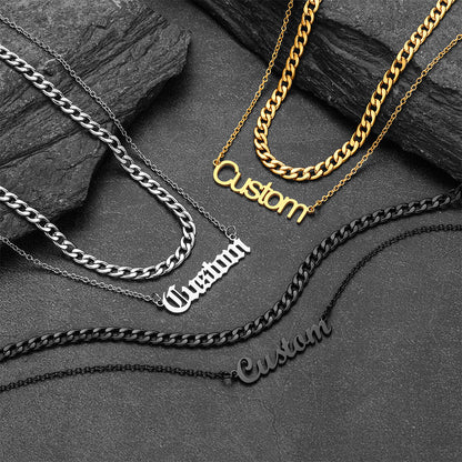 Collection of customizable chain necklaces on a dark stone surface