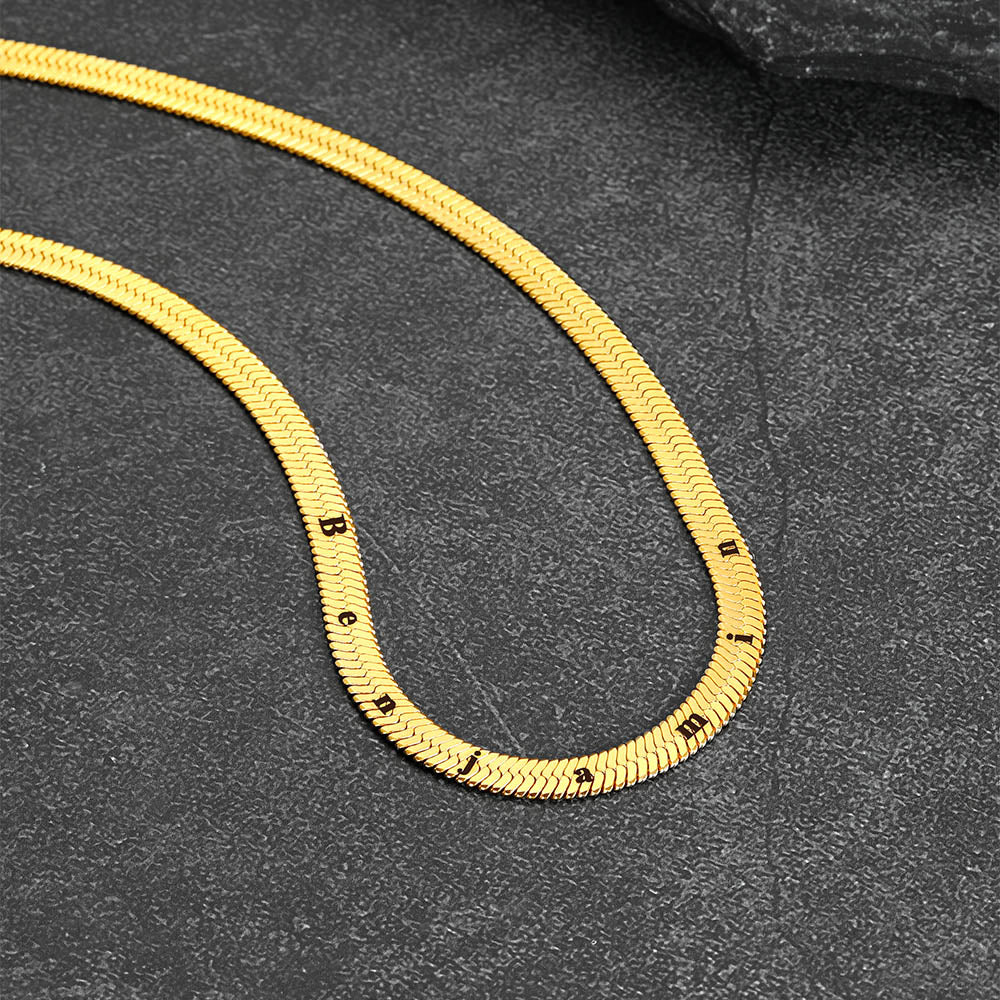 Close-up of polished surface with mirror shine and clear engraving line