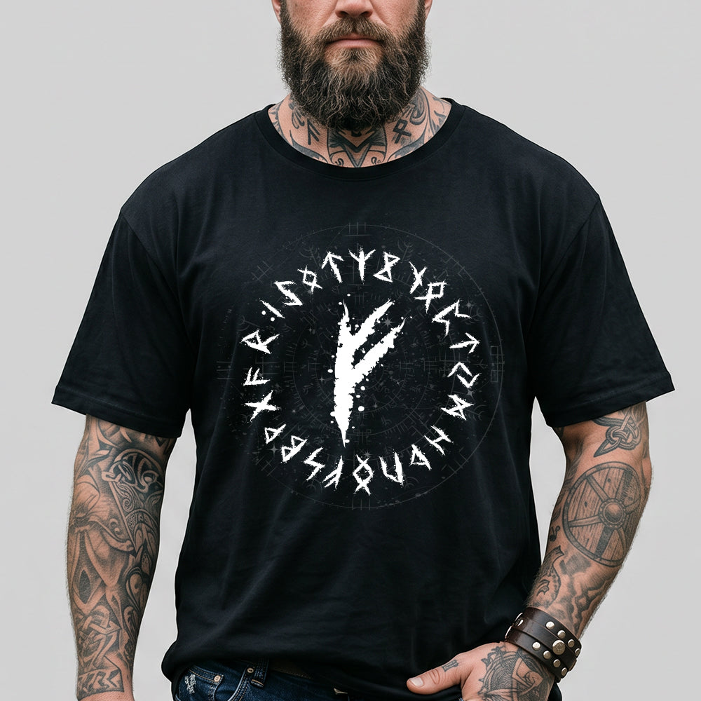 Man wearing a black t-shirt with a white viking rune design on a gray background