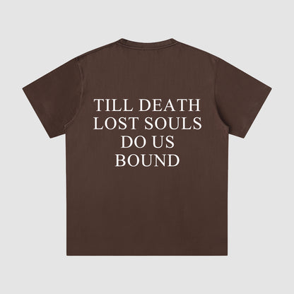 Brown t-shirt with white text on a light gray background