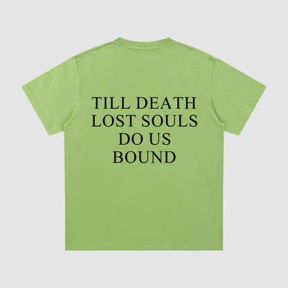 Green t-shirt with text 'TILL DEATH LOST SOULS DO US BOUND' on a light gray background