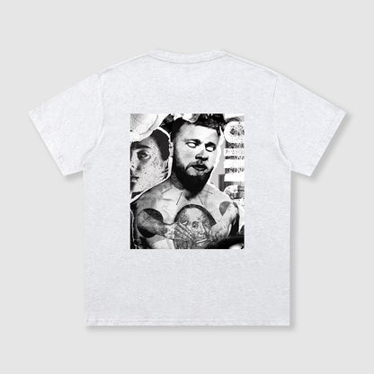 White t-shirt with black and white graphic design on a light gray background