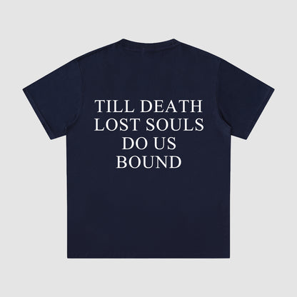 Navy blue t-shirt with white text on a light gray background