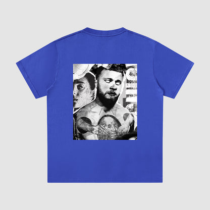 Blue t-shirt with a graphic of a tattooed person on a white background