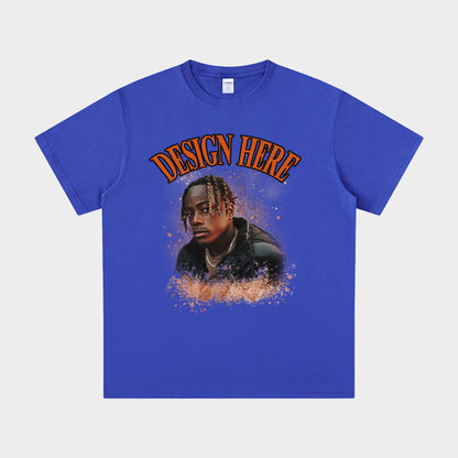 Blue t-shirt with a graphic of a person and 'Design Here' text on a white background