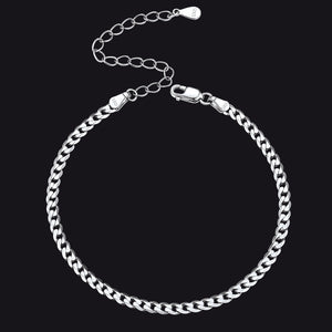 Silver chain bracelet on a black background