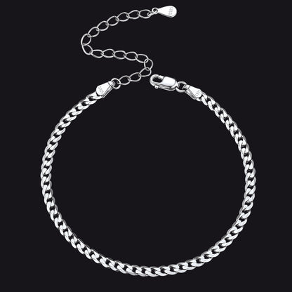 Silver chain bracelet on a black background