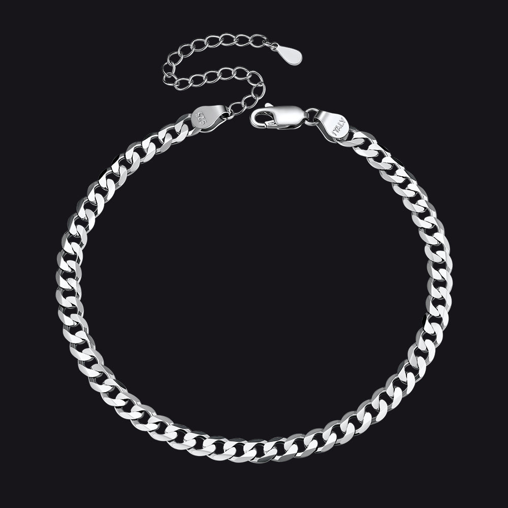 Silver chain bracelet on a black background