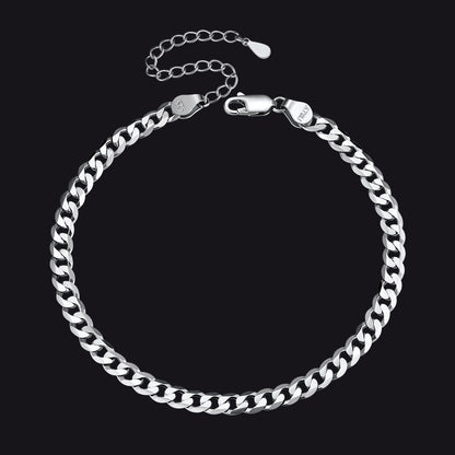 Silver chain bracelet on a black background