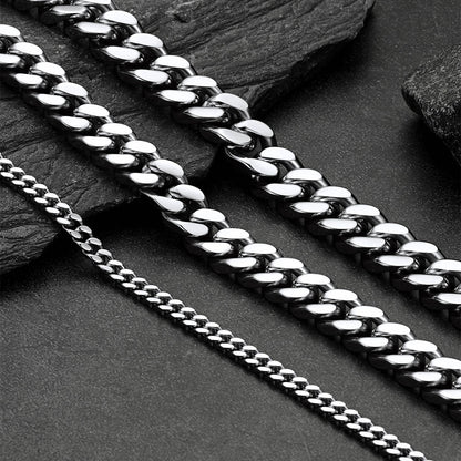 Chunky Cuban link chain choker necklaces in 5mm, 12mm, and 14mm widths displayed side by side
