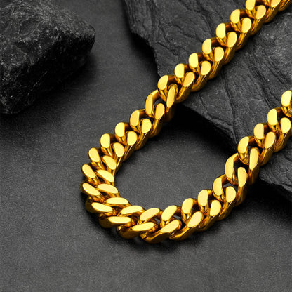Chunky Cuban link choker necklace laid flat on white background, thick statement chain