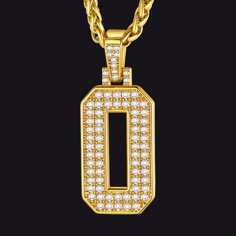 Gold pendant with diamonds on a black background