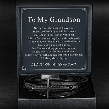Black box with a bracelet and a message card inside on a dark background