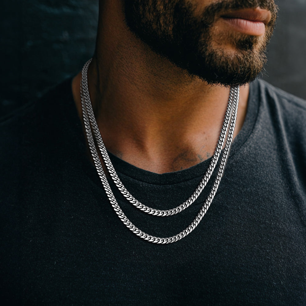 Model Wearing Steel 6MM Cuban Link Chain – Layered Fashion