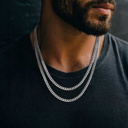 Model Wearing Steel 6MM Cuban Link Chain – Layered Fashion