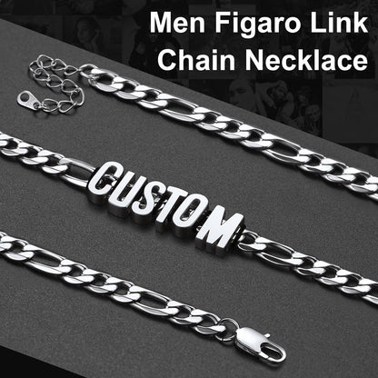 Men's Figaro link chain necklace with 'CUSTOM' clasp on a dark background