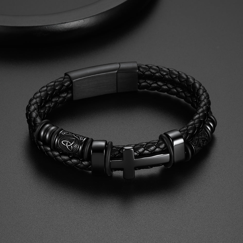 Celtic cross leather bracelet flat lay, braided wristband with Celtic kno