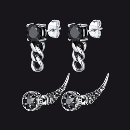 Pair of silver chain earrings with black gemstones on a black background