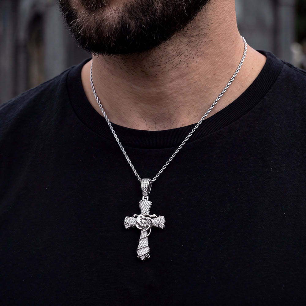 Man wearing gothic thorns rose crucifix cross necklace on chest, front view