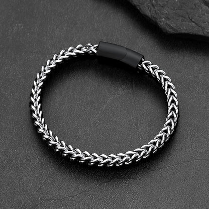 Front and side view of curb chain leather bracelet, stainless steel links with braided leather wristband