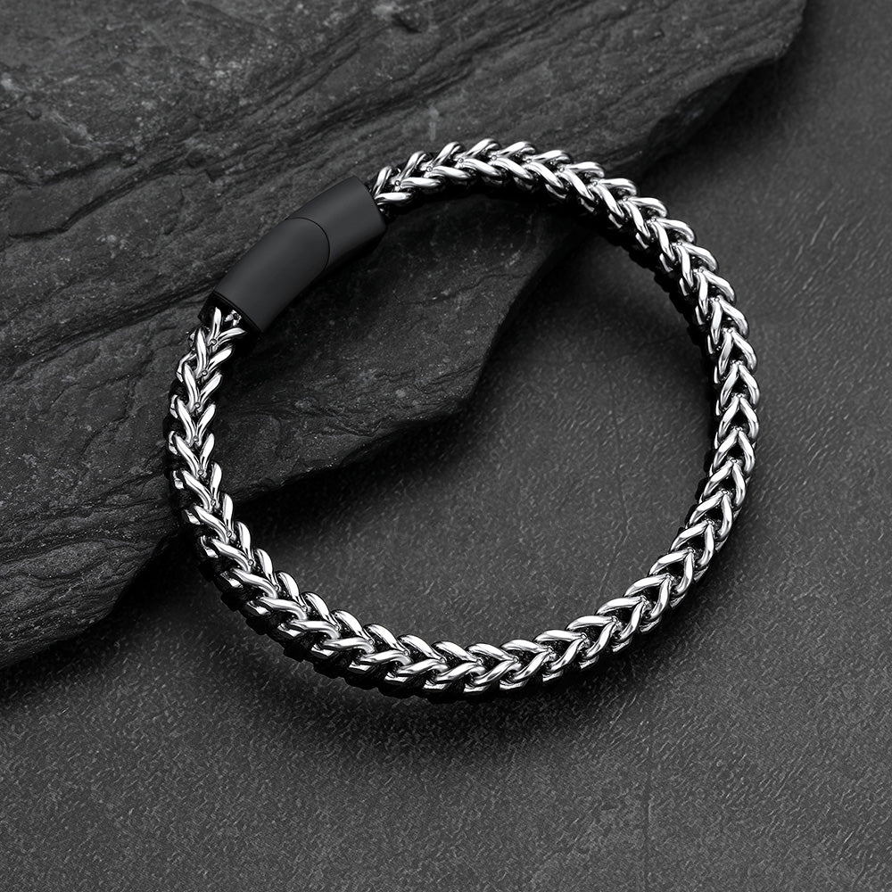 Front and side view of curb chain leather bracelet, stainless steel links with braided leather wristband