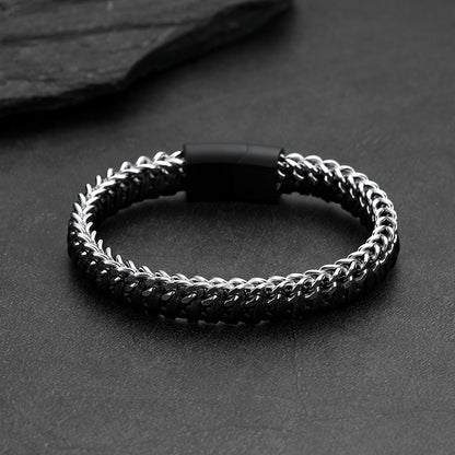 Front and side view of curb chain leather bracelet, stainless steel links with braided leather wristband