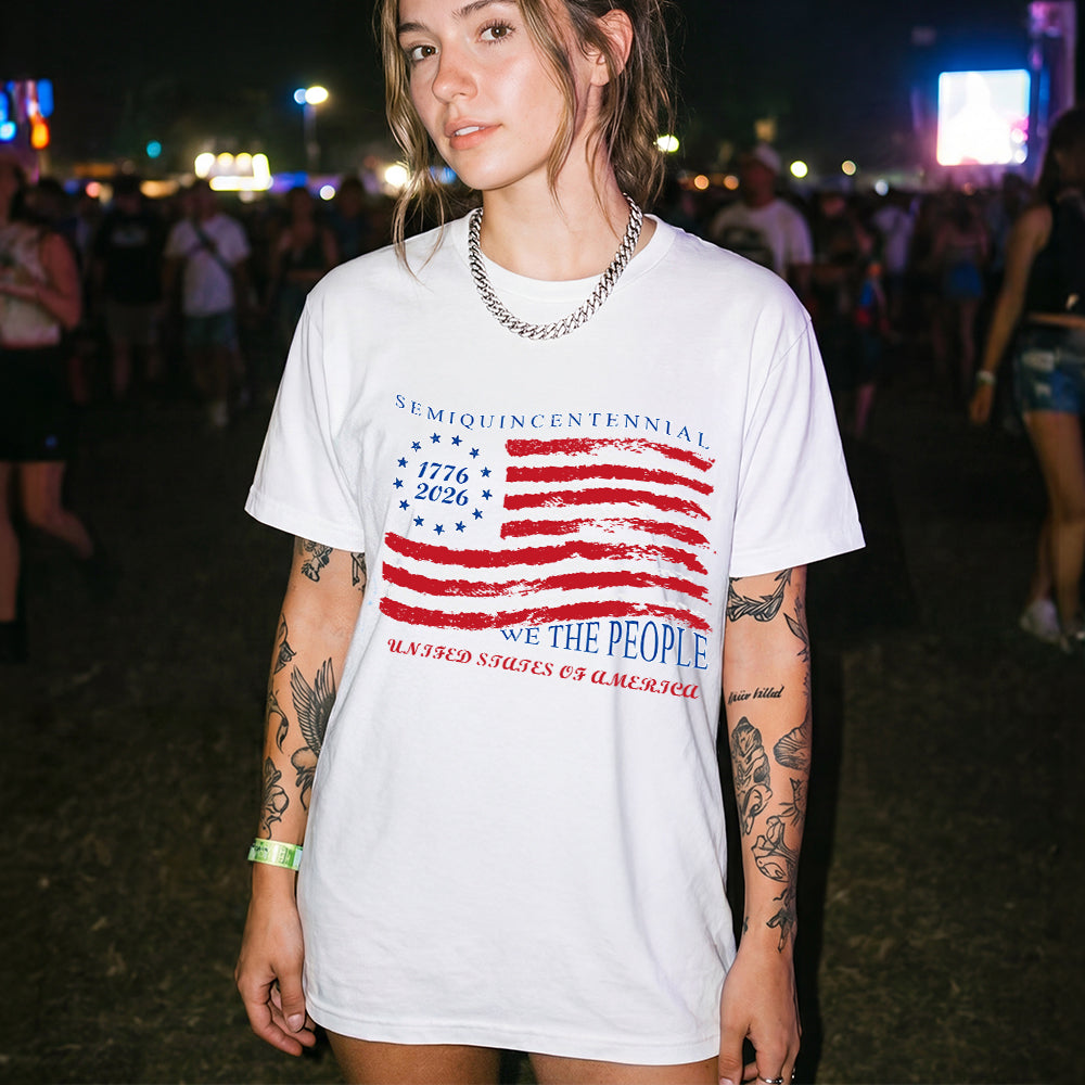 Person wearing a white USA Flag Patriotic T-Shirt with a red and blue graphic design at a concert.