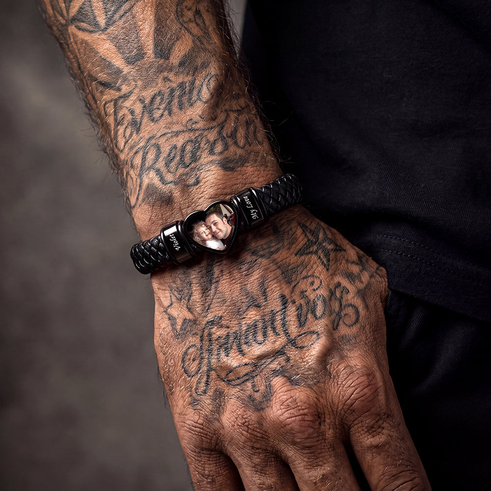 Man wearing custom heart-shape picture black braided leather bracelet on wrist