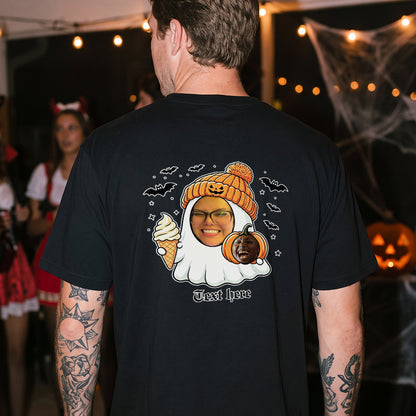 A man viewed from behind wearing a black t-shirt with a large custom graphic on the back. 