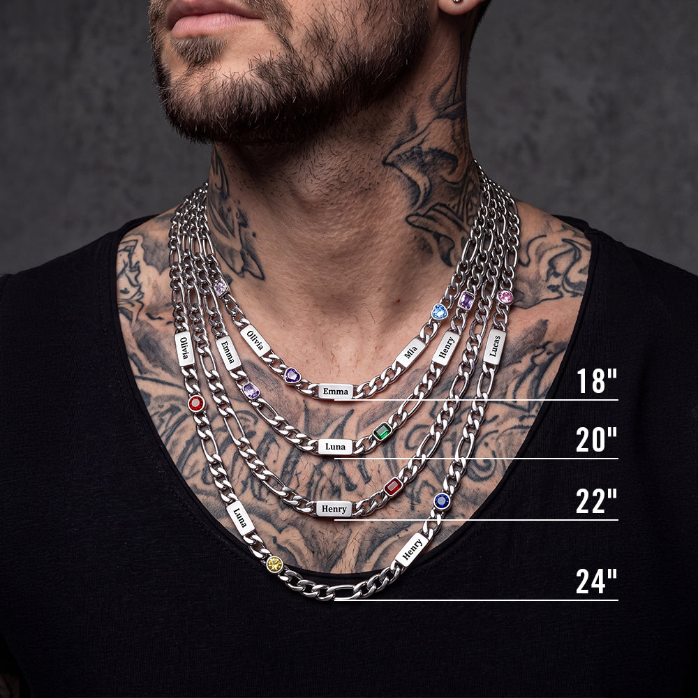 A close-up of a man wearing layered silver chain necklaces with size labels 18", 20", 22", and 24".