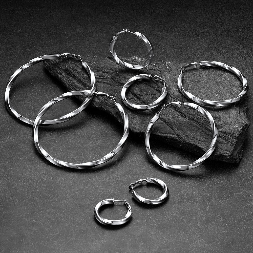 Steel Hoop Earrings All Sizes Flat Lay