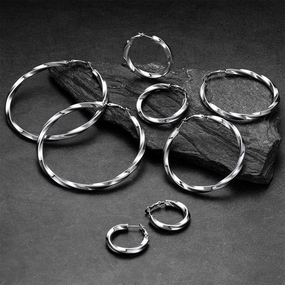 Steel Hoop Earrings All Sizes Flat Lay
