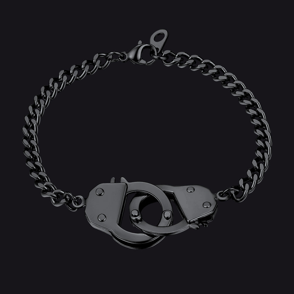 Black chain bracelet with handcuff clasp on a black background