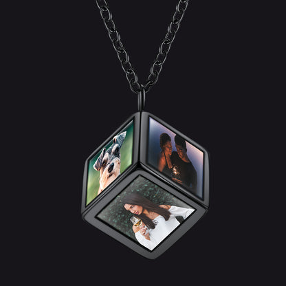 Black hexagonal pendant with four square panels displaying images on a black background