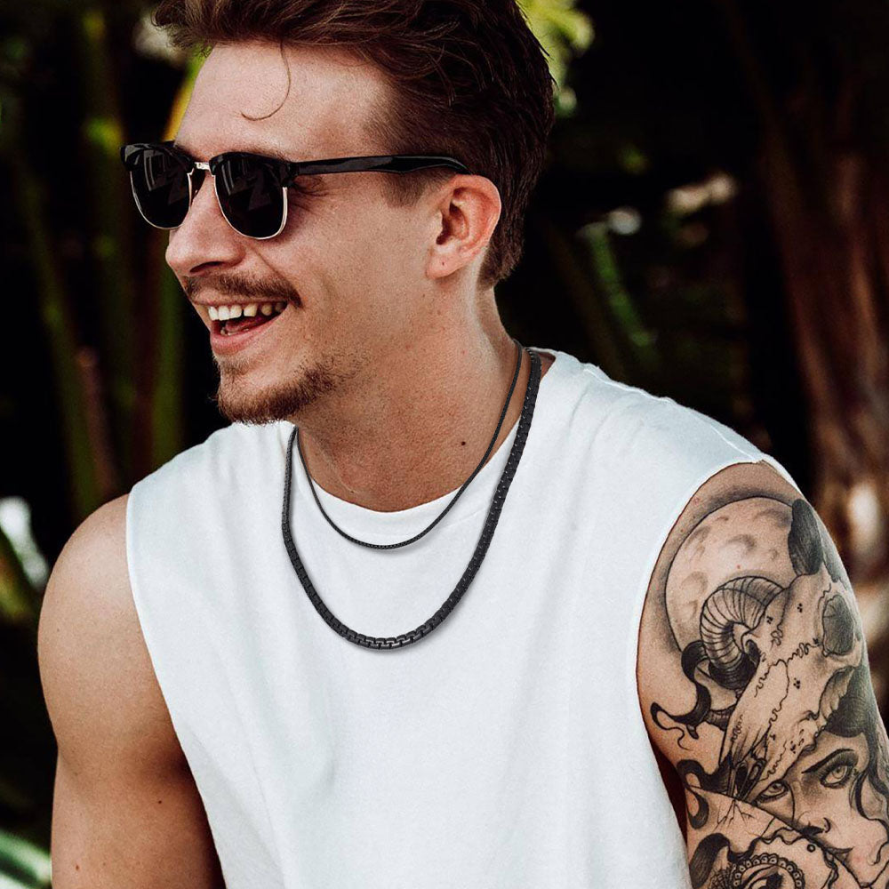 Male model wearing 6mm black flat box chain necklace with casual shirt