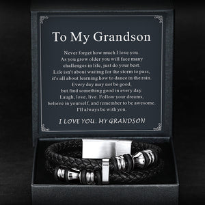 Gift box with leather bracelet and pen set, featuring a message to Grandson