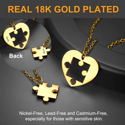 Gold-plated heart-shaped puzzle piece necklace on a dark background