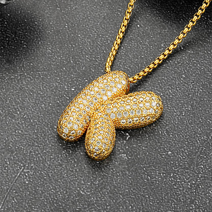 Close-up of cubic zirconia on initial pendant