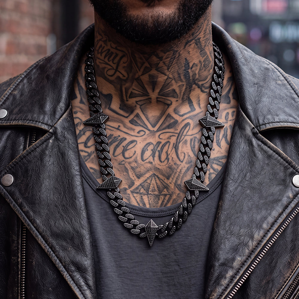 A close-up of a man wearing Zircon Spiked Star Sword Charm Chain Necklace