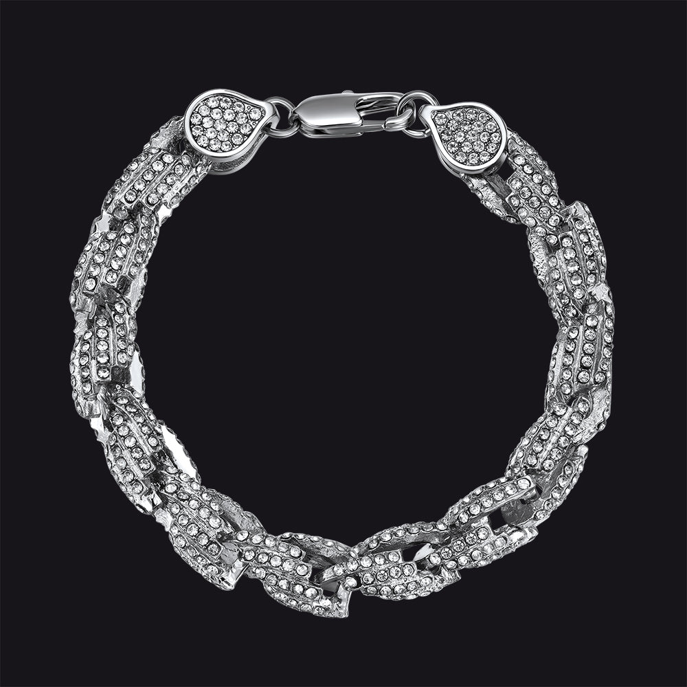 A silver-toned multi-strand chain bracelet paved with clear rhinestones, featuring a lobster clasp and heart-shaped end caps, shown against a solid black background.