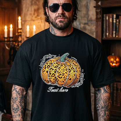 A man wearing a black graphic t-shirt with a leopard-print pumpkin design and the text.