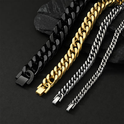 Four chain(6/8/12/17mm) necklaces in black, gold, and silver on a dark background