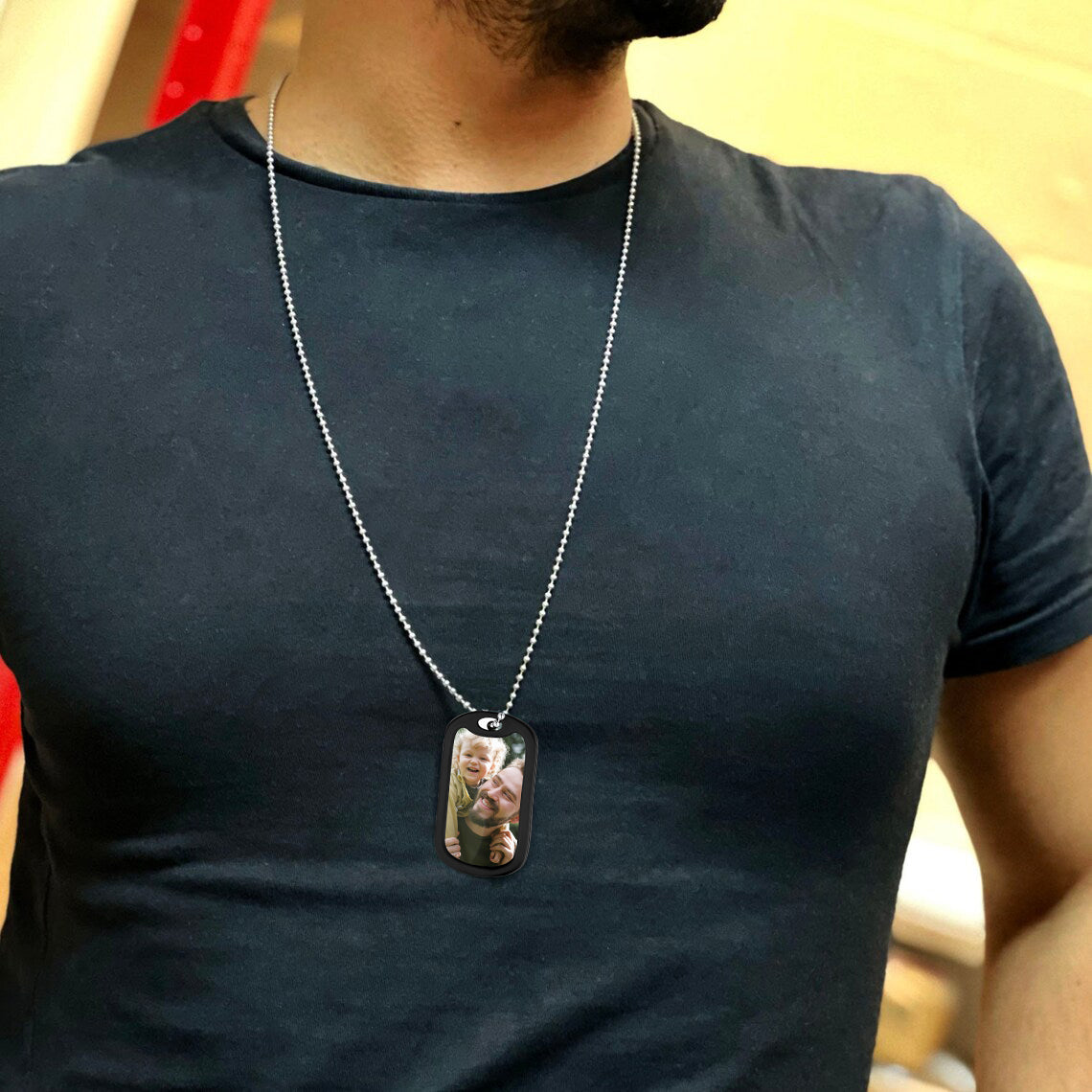Man wearing personalized photo dog tag necklace