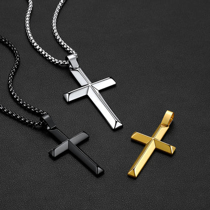 Three cross pendant necklaces on chains, shown on a dark textured background.