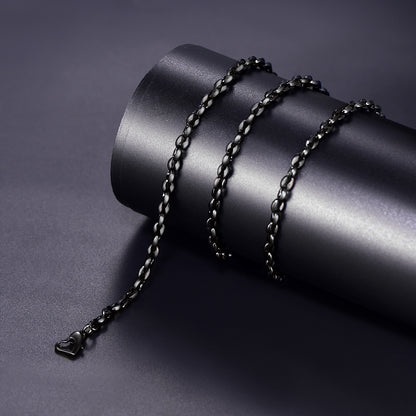 Black chain necklace on a dark cylindrical object
