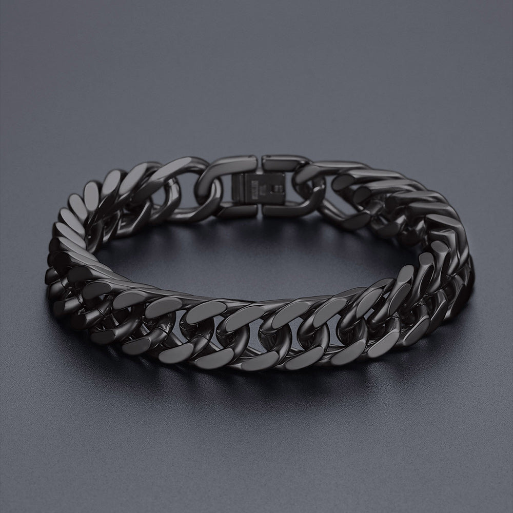 Black chain bracelet on a dark gray background