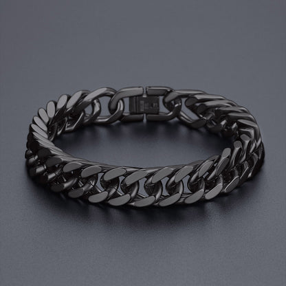 Black chain bracelet on a dark gray background