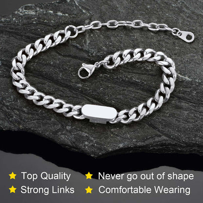 Silver chain bracelet on a dark stone surface with quality attributes listed.